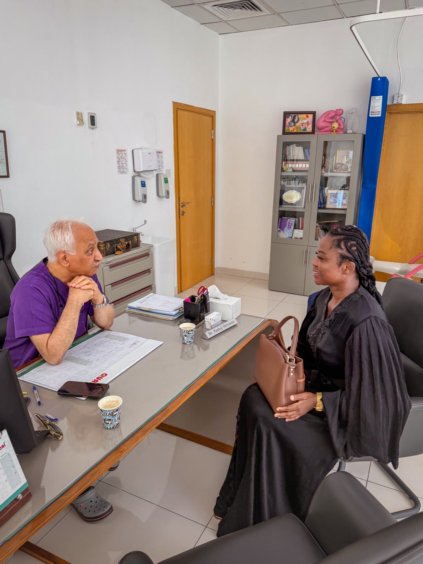 Dr. Kankam meeting with a partner physician